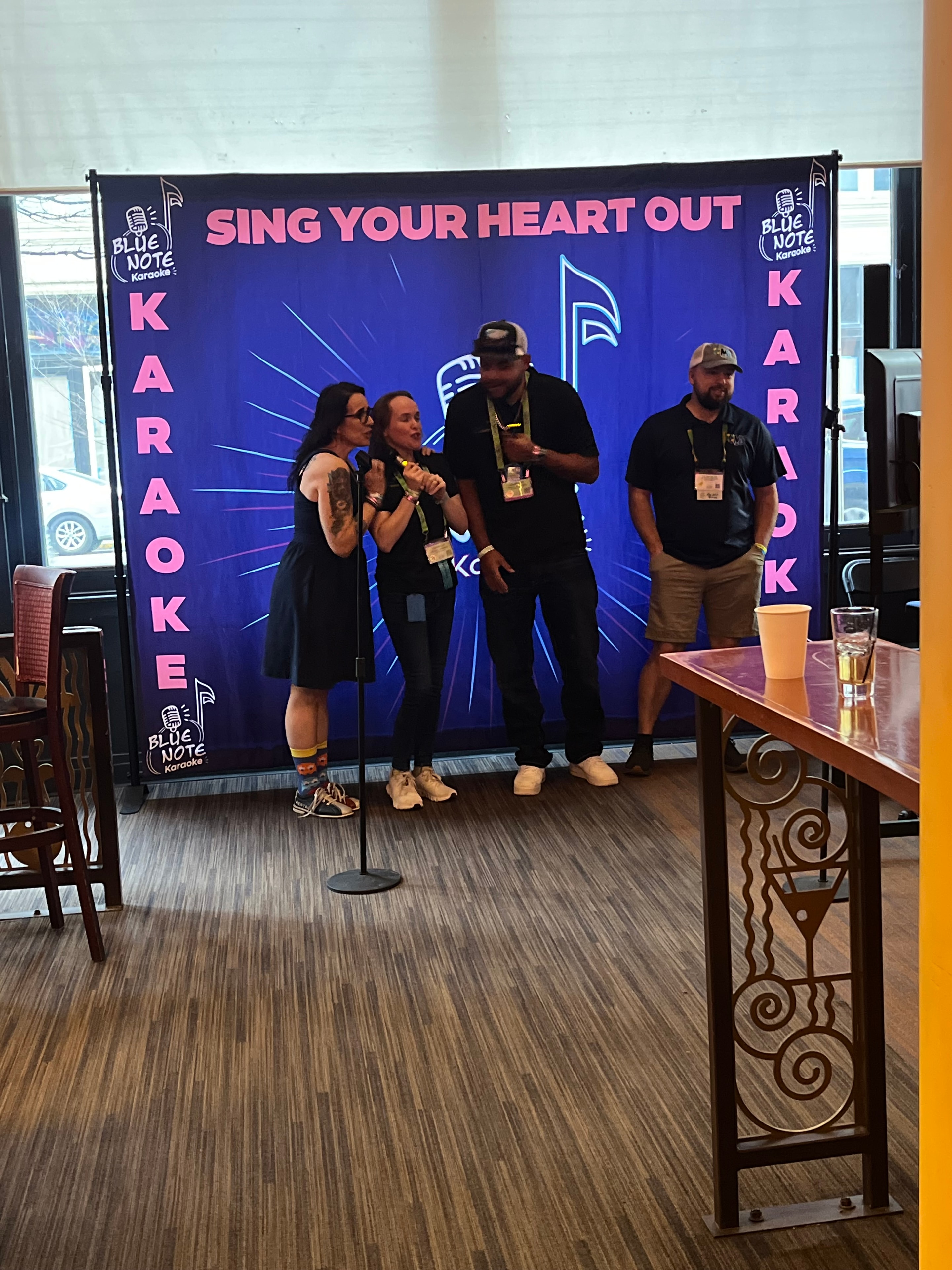 Group singing at Flamingo Bowl karaoke event