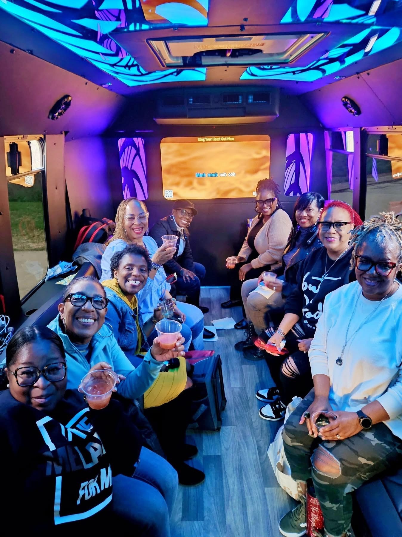 Girls day party group on the karaoke bus